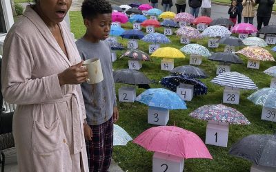 My Son Gave His Umbrella to a Pregnant Stranger in the Rain – The Next Morning, 47 Umbrellas Appeared on Our Lawn, Each With a Numbered Box That Made My Heart Stop