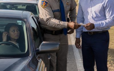 My wife got pulled over for speeding, and after the officer checked her license, he asked me to step out of the car. His face turned serious. “Sir, you need to hear me carefully. Do not go home tonight. Go somewhere safe.” I just stared at him. “What? Why?” He hesitated, then lowered his voice. “I can’t explain it here. But what I found is bad. Very bad.” Then he slipped a note into my hand. When I opened it, my whole world changed.